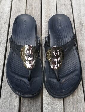Crocs thong sandals with decorative metallic circles